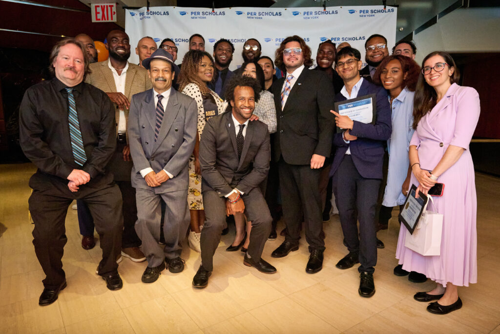 Group of people posing happily for a graduation picture